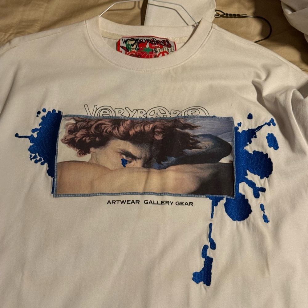 Very rare by RAF Reyes White and Blue Angel Tee